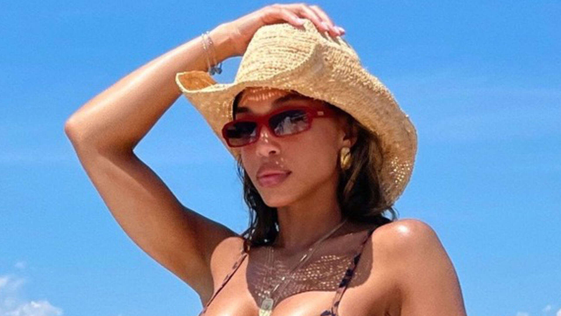 Lori Harvey wears tiny string bikini as she shows off her life of luxury while sliding down a yacht on France getaway