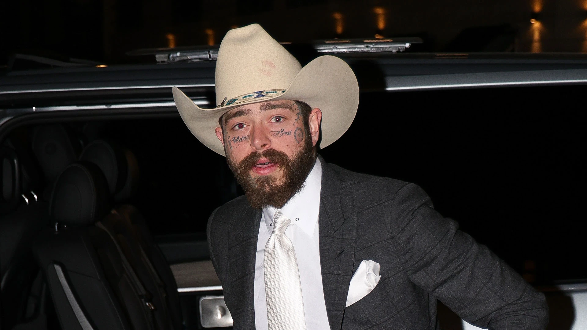 Post Malone hit with nearly $500k in tax liens despite star taking new girlfriend Christy Lee, 20, on lavish Paris trip