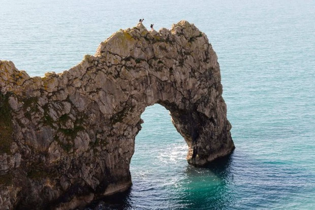 Daughter saw mum plunge 150ft to death as she lost footing on Durdle Door