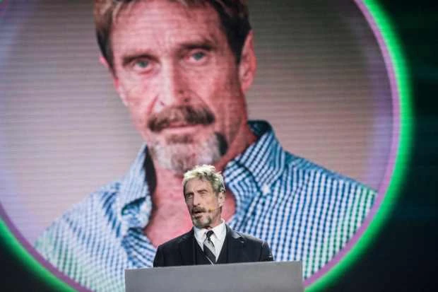 What is the John McAfee QAnon conspiracy theory?