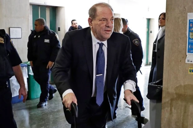 Weinstein puts head in hands as he's told he'll face more charges in LA