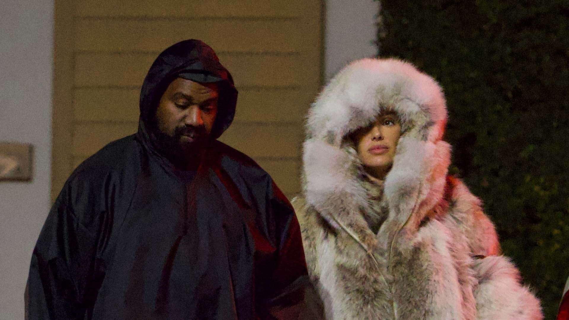 Bianca Censori looks serious as she goes pantless under massive fur coat after leaving LA movie theatre with Kanye West