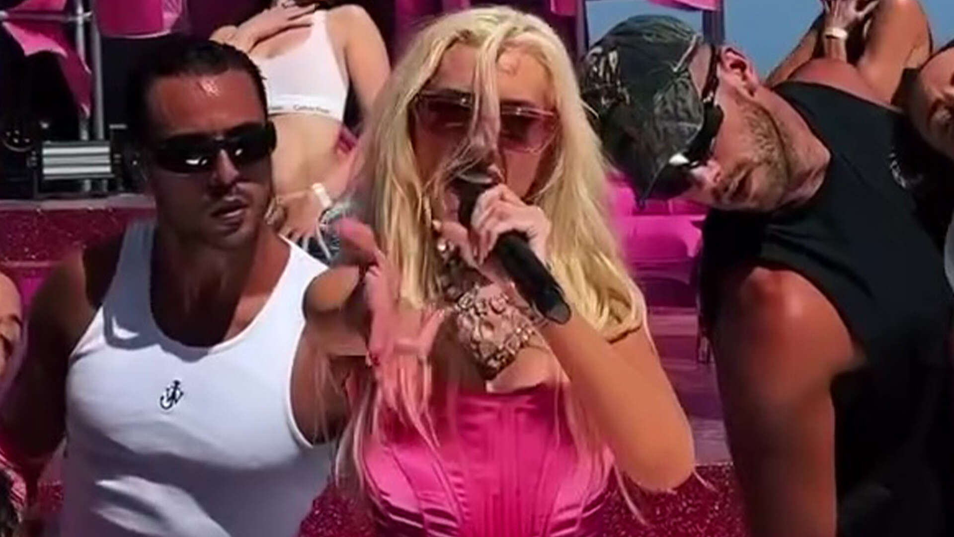 Christina Aguilera flashes her very slim figure in hot pink bodysuit while performing after weight loss