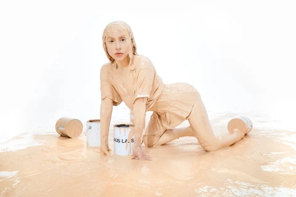 Lady Gaga, 39, covers herself in flesh-coloured paint as she promotes her new makeup range in epic photoshoot