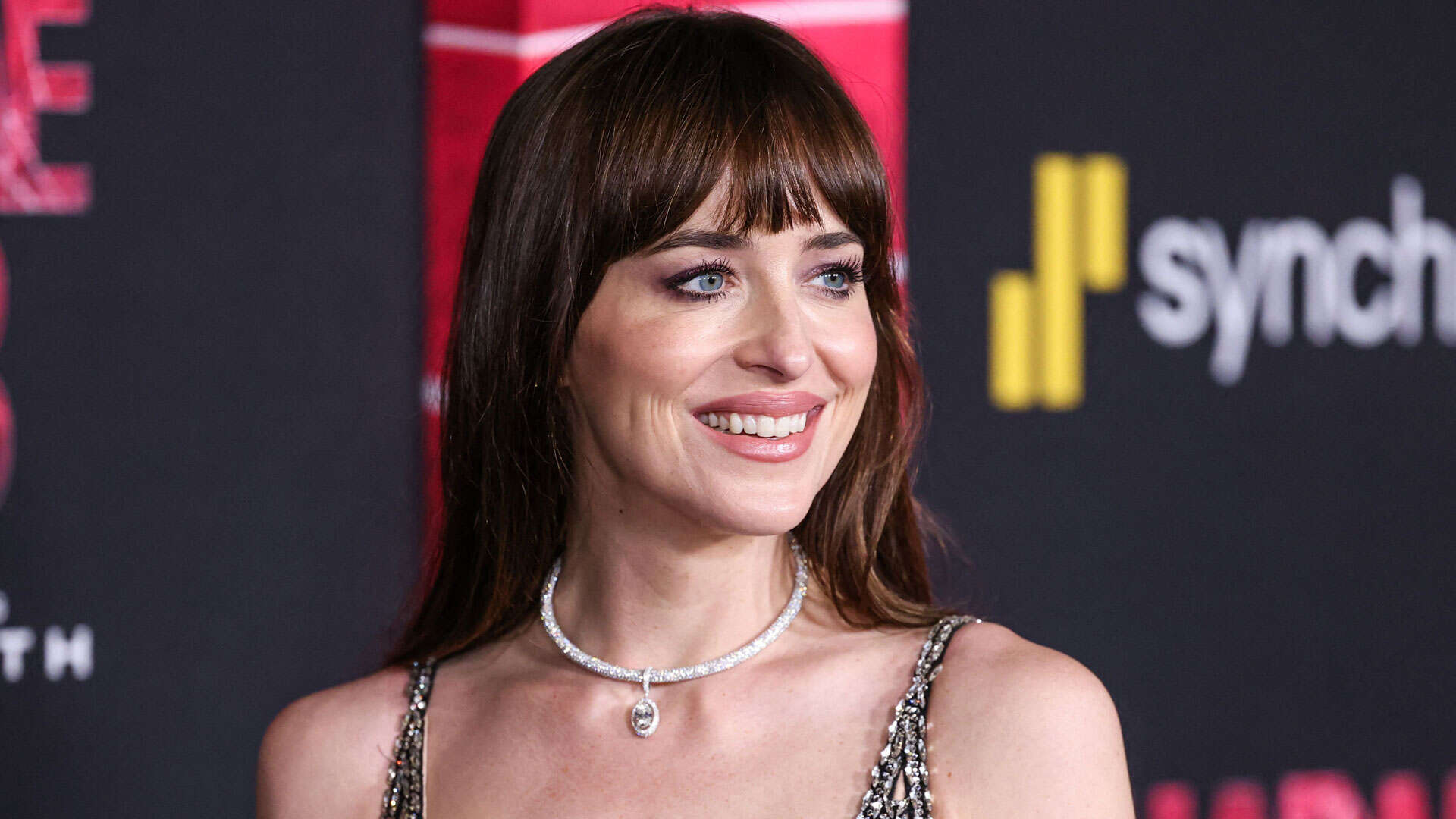 Dakota Johnson ‘slips and reveals’ she secretly married Chris Martin, fans insist after spotting ‘clue’ in interview