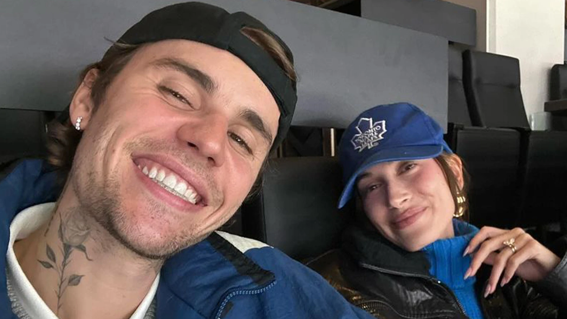 Hailey Bieber’s growing baby bump pops out of unbuttoned shirt as she dines at sushi restaurant without husband Justin