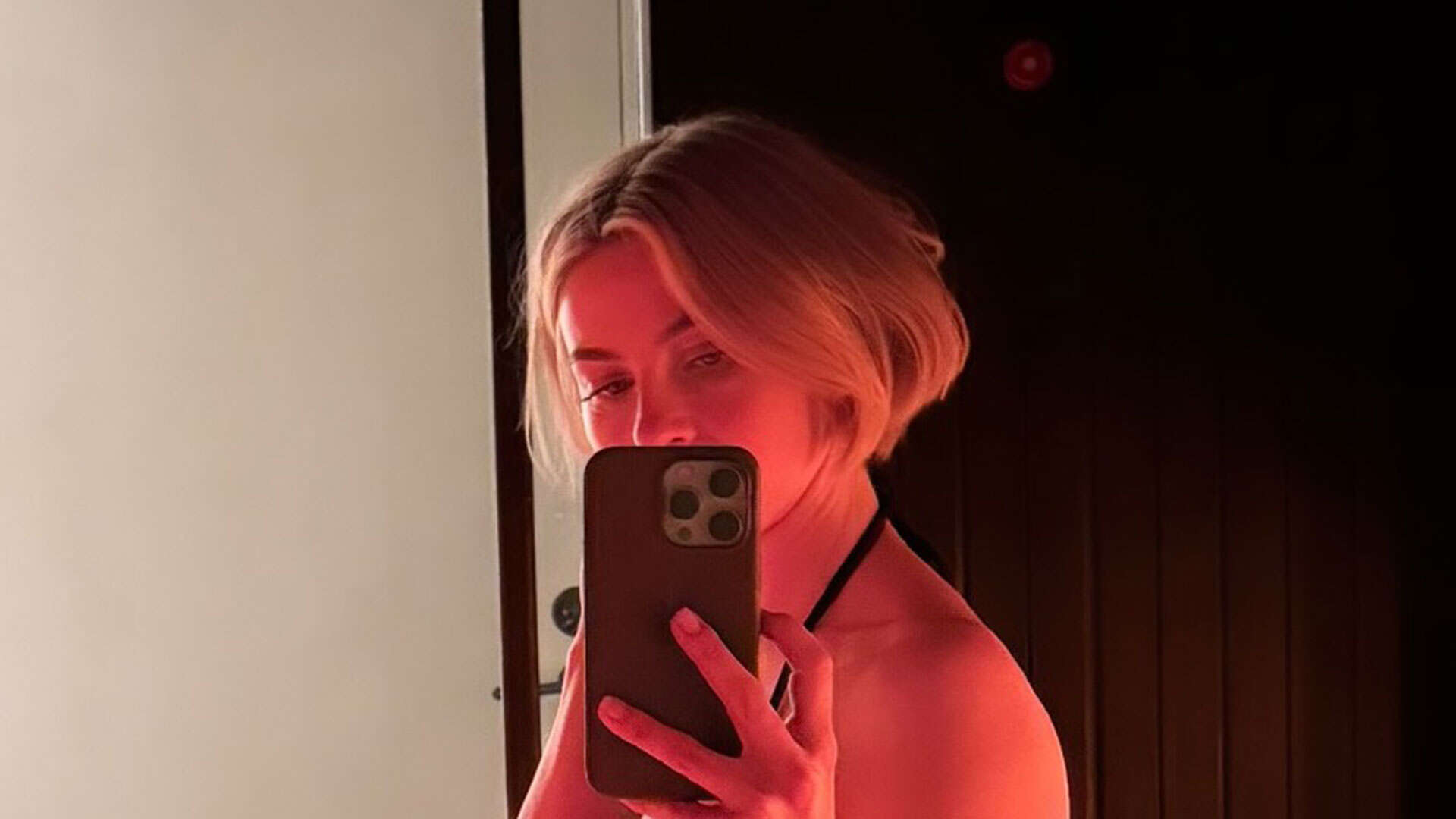 Julianne Hough shows off her toned figure in teeny black bikini after spending time in an ice bath and sauna