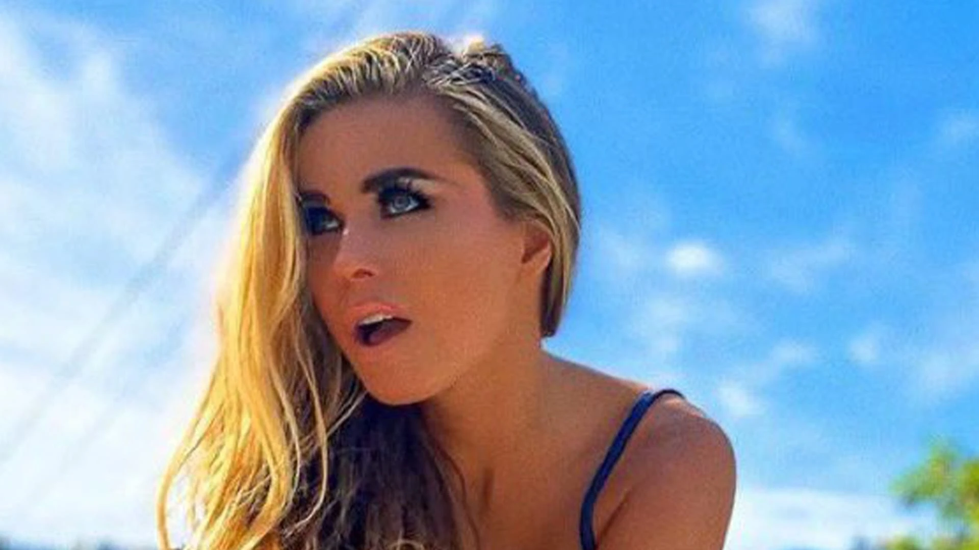 Carmen Electra, 53, shows fit body in bra and super short shorts as ageless model teases ‘cheeky!’