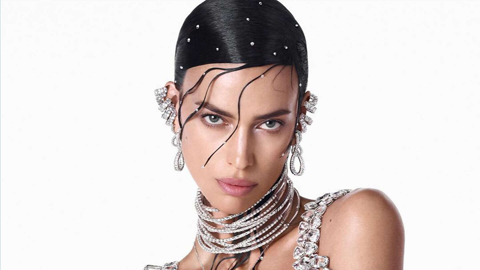 Irina Shayk poses in crystal bra and shows off bold new hair for Swarovski ad as fans say her beauty is ‘unreal’