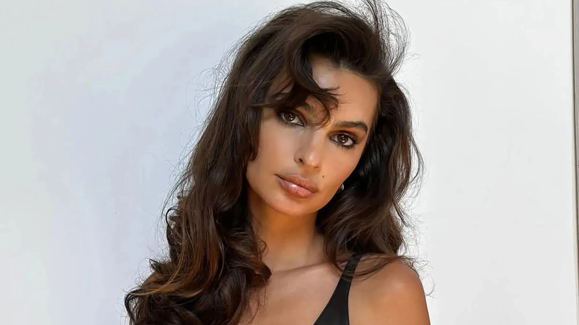 Emily Ratajkowski looks incredible as she shows off amazing figure in leather bra top and sheer trousers