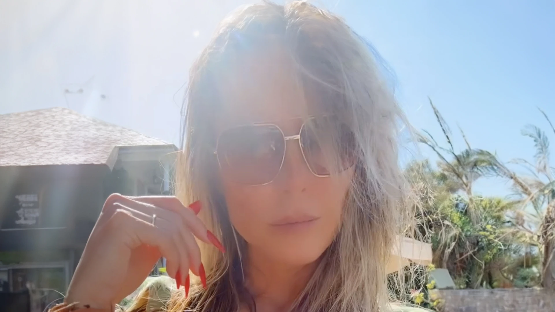 Heidi Klum, 51, puts her breasts on quite the display in jewel-covered bikini while lounging in the sun