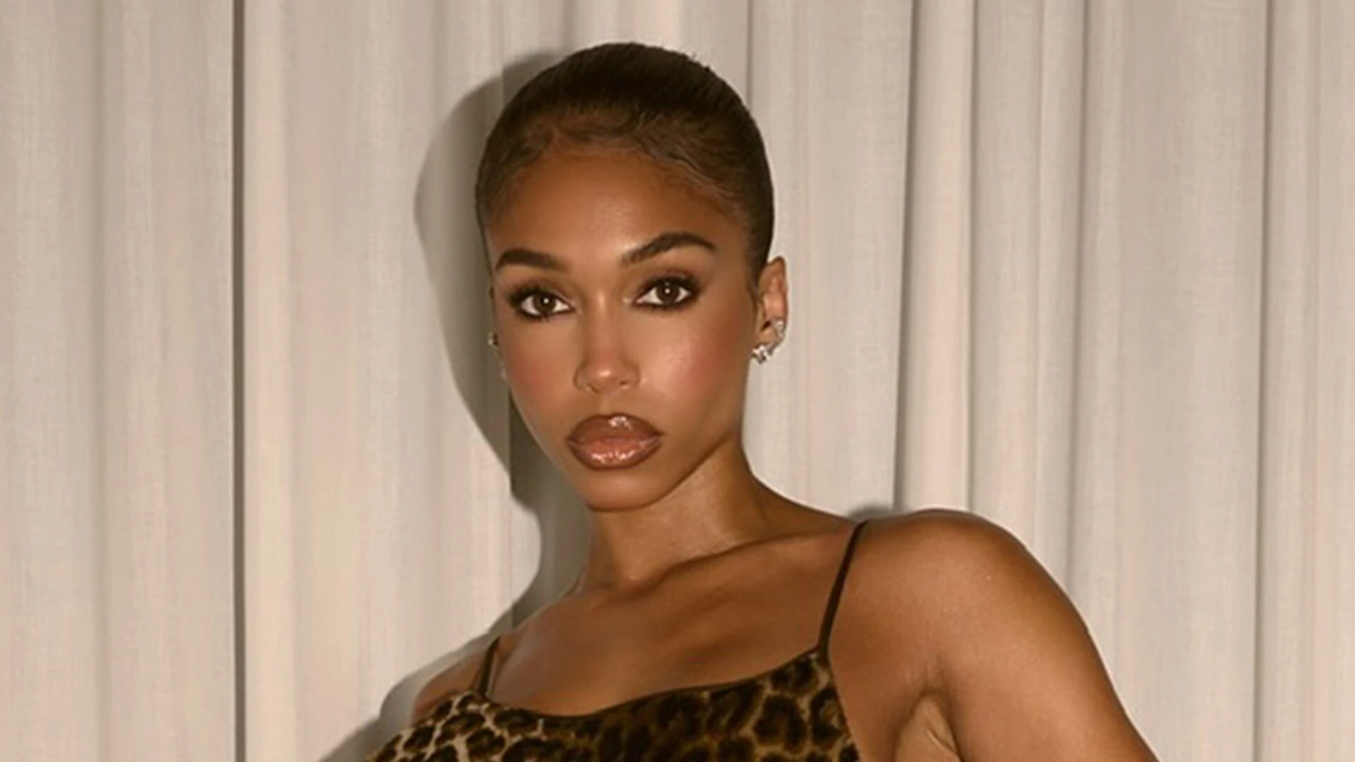 Lori Harvey glows as she goes braless in leopard-print top at LA fashion party