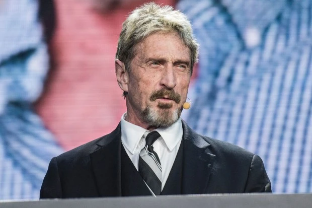 Why was John McAfee on the run?