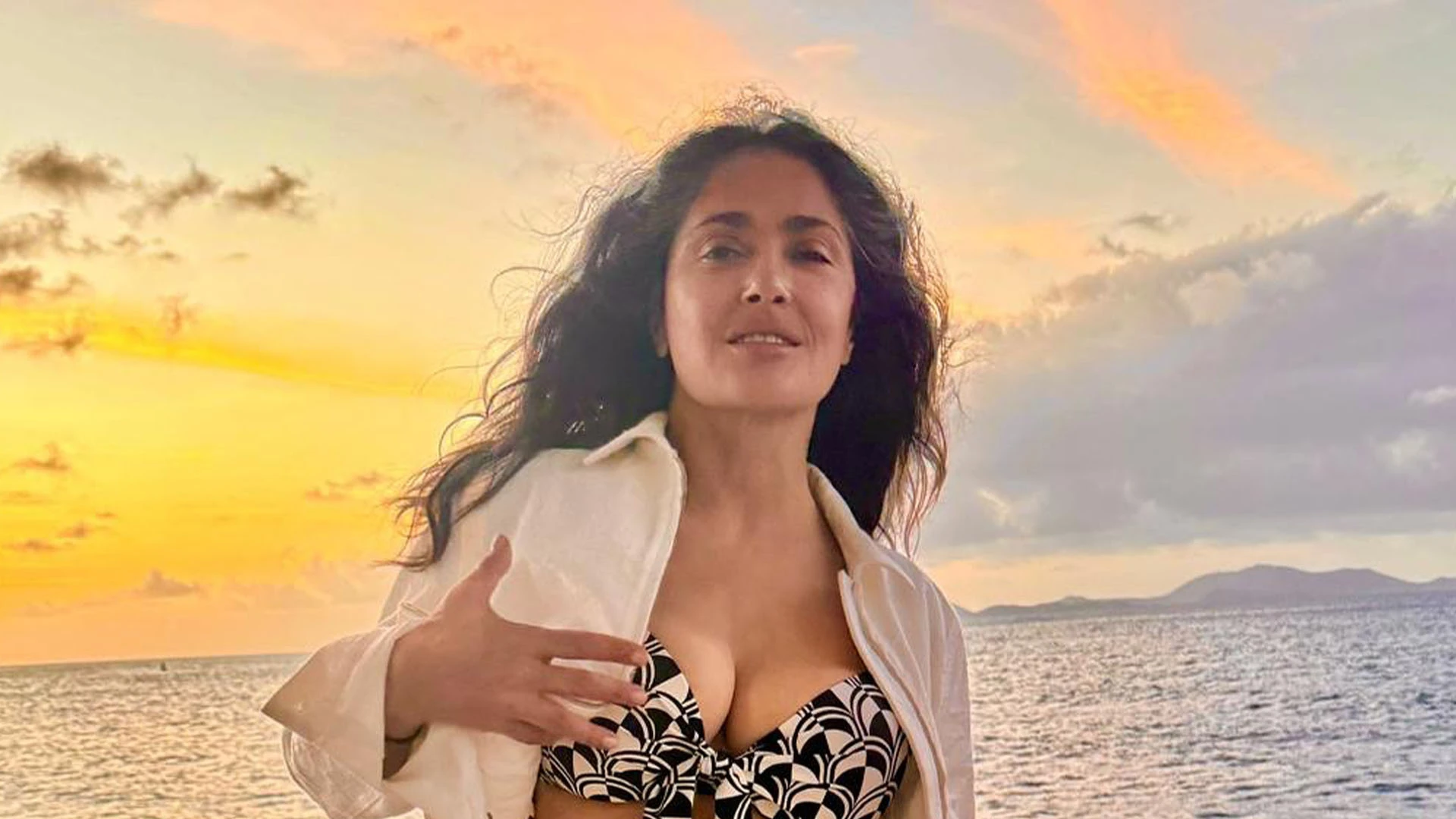 Salma Hayek, 58, spills out of tiny green bikini and displays fit figure for shoot as fans insist she’s ‘still got it!’