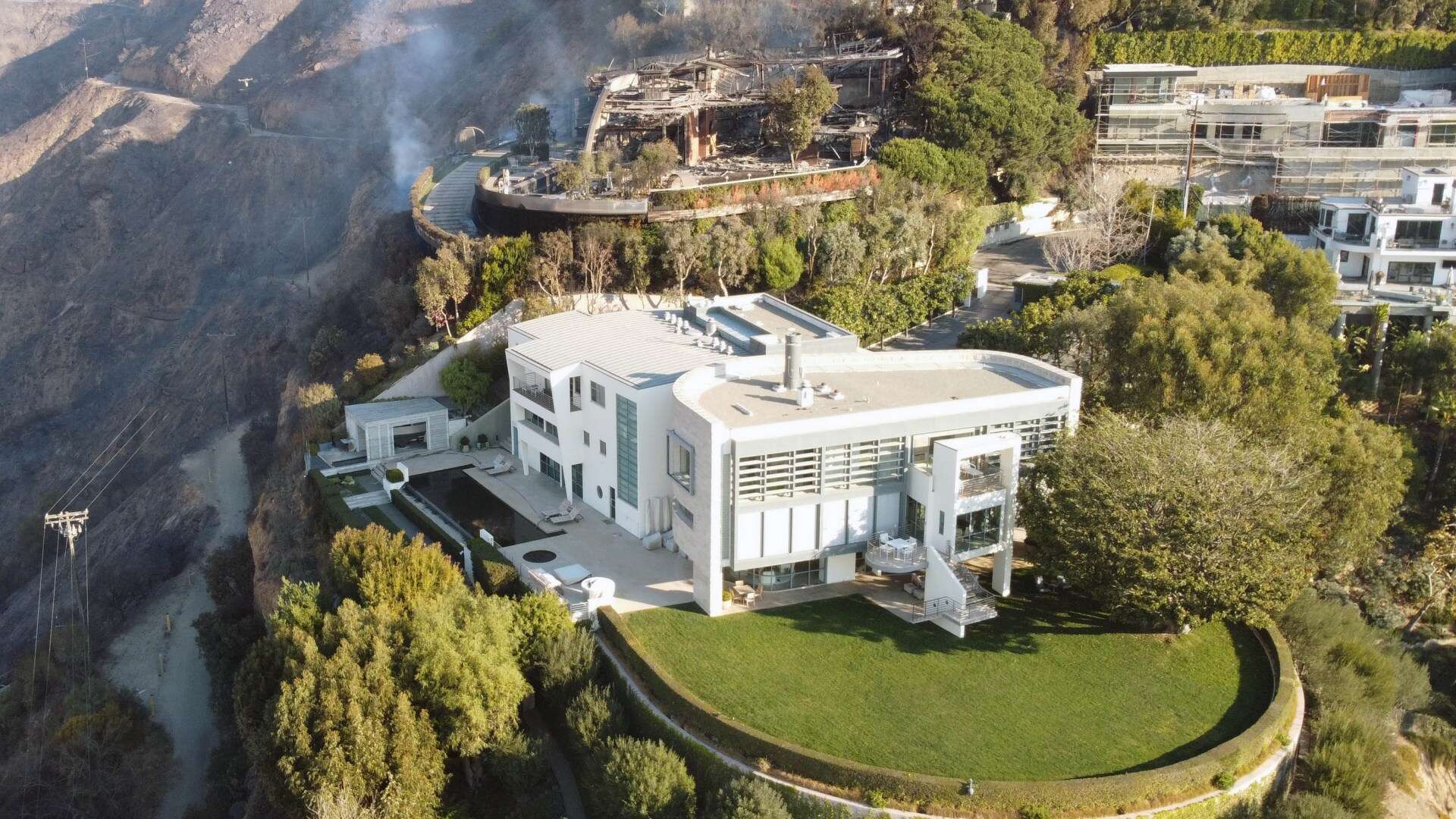 Chilling pics show how LA fires missed celeb homes by INCHES with Tom Hanks & Steven Spielberg’s mansions safe…for now