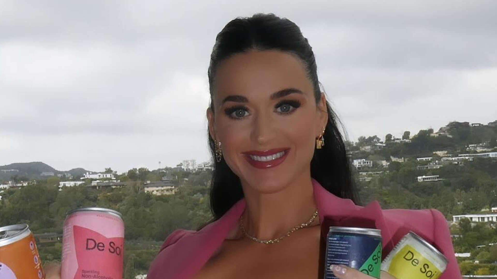 Katy Perry shows off fit figure in pink blazer and dress in rare unedited pics after announcing exit from American Idol