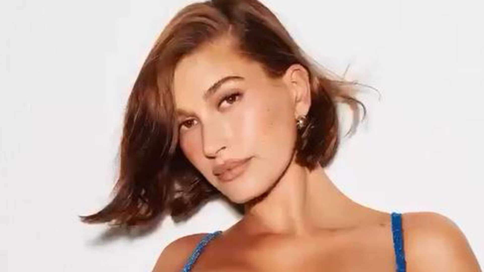 Hailey Bieber reveals model figure in blue bikini for Victoria’s Secret – and fans say she looks ‘beautiful and real’