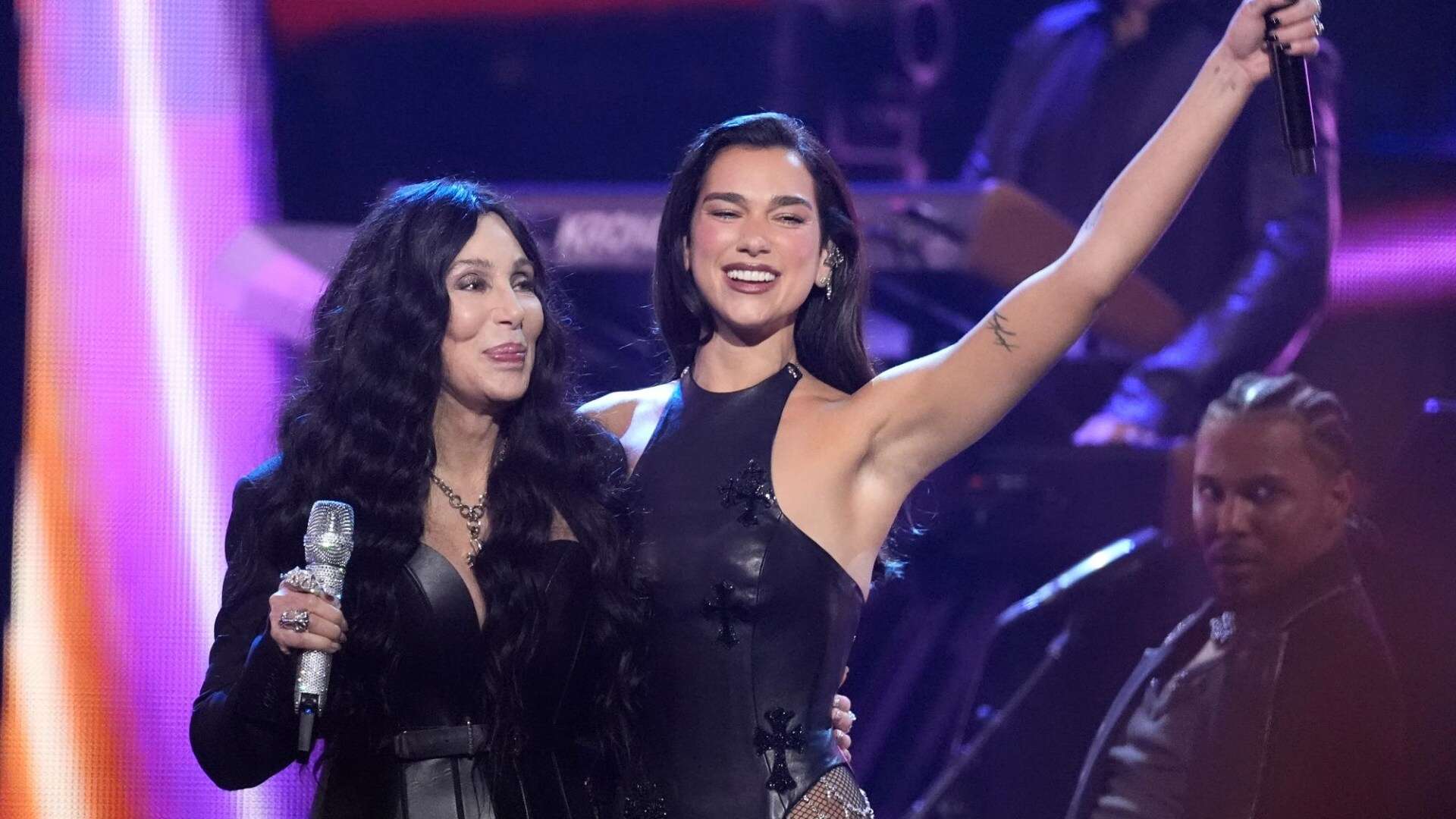 Dua Lipa joins Cher to perform her iconic hit at Rock & Roll Hall Of Fame as they stun on the red carpet with Zendaya