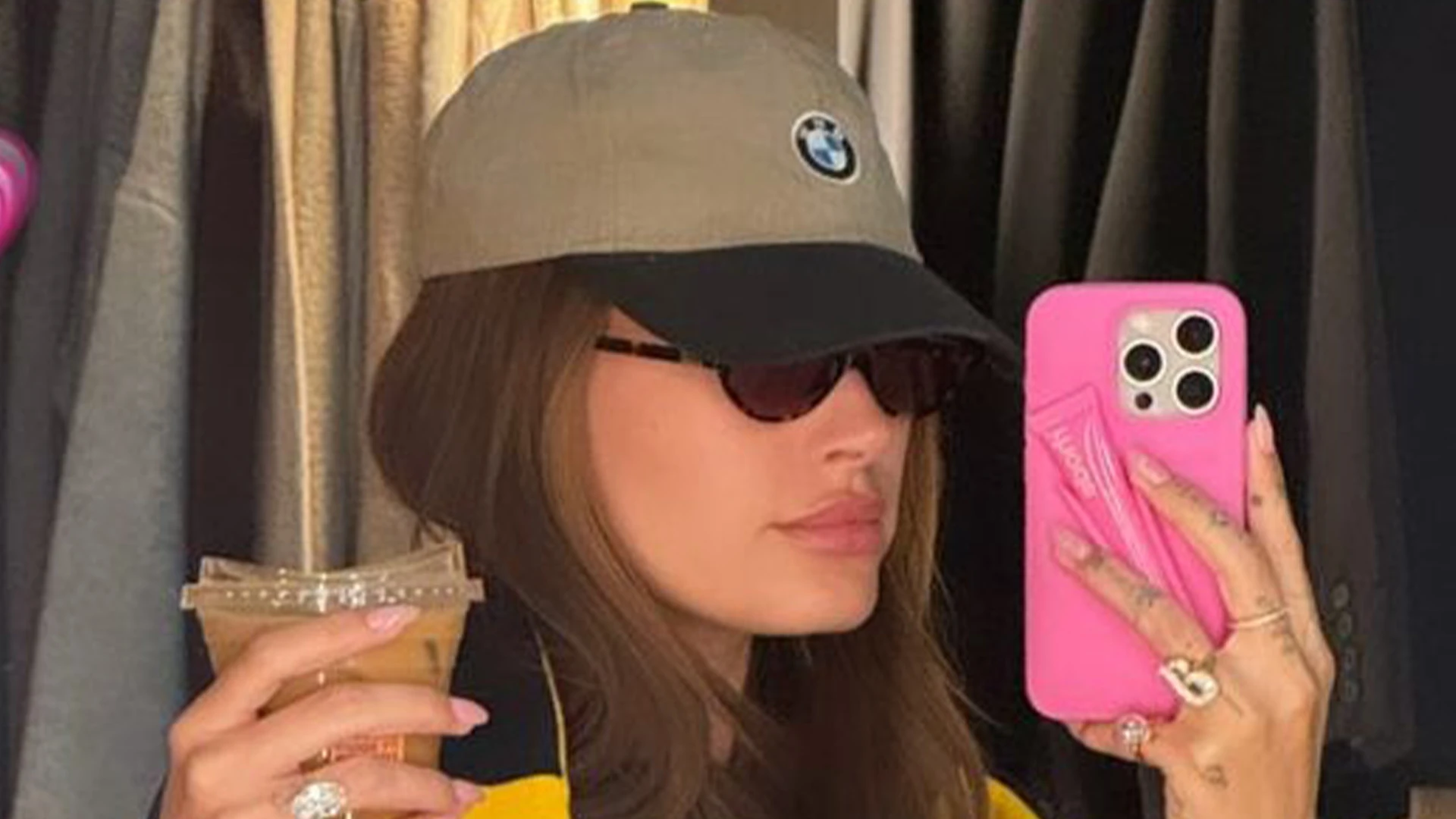 Hailey Bieber shares new photos of growing baby bump at Rhode headquarters as fans gush over update