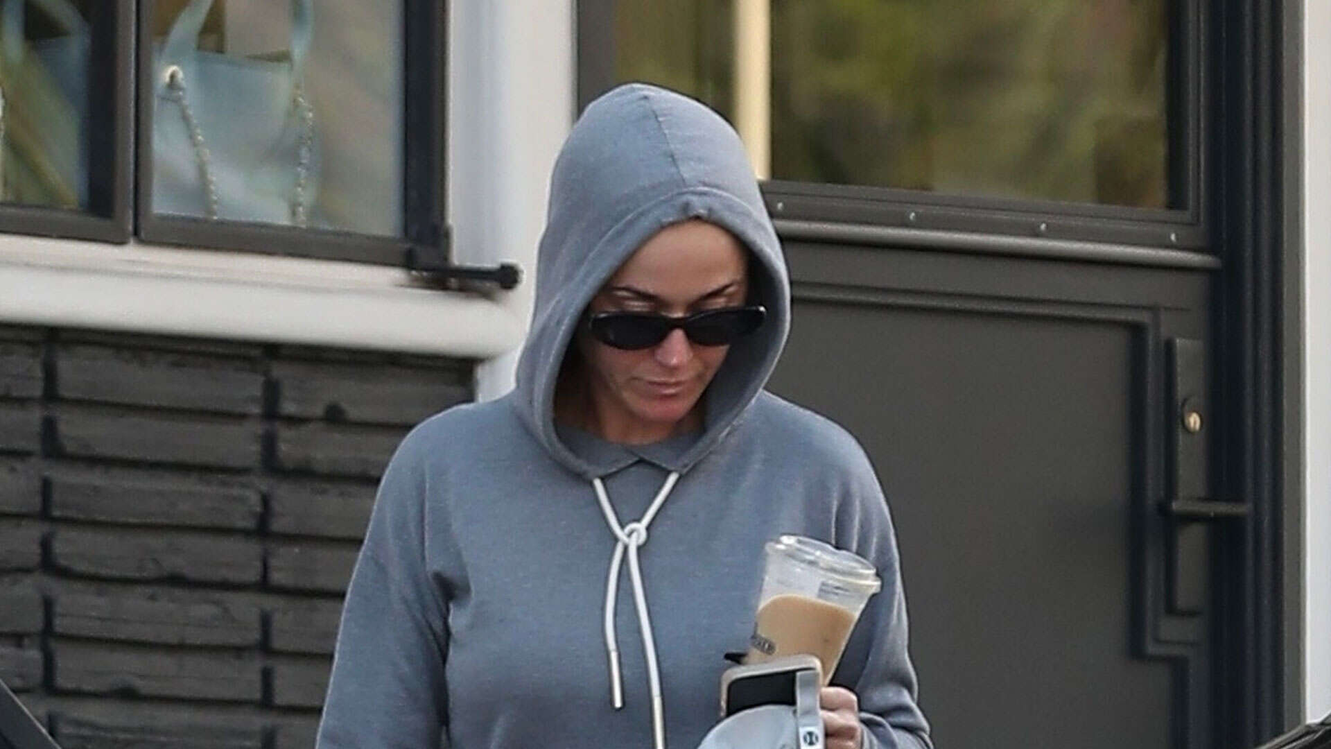 Katy Perry covers up her stomach in baggy sweats on LA stroll after sparking rumors she’s pregnant with second child