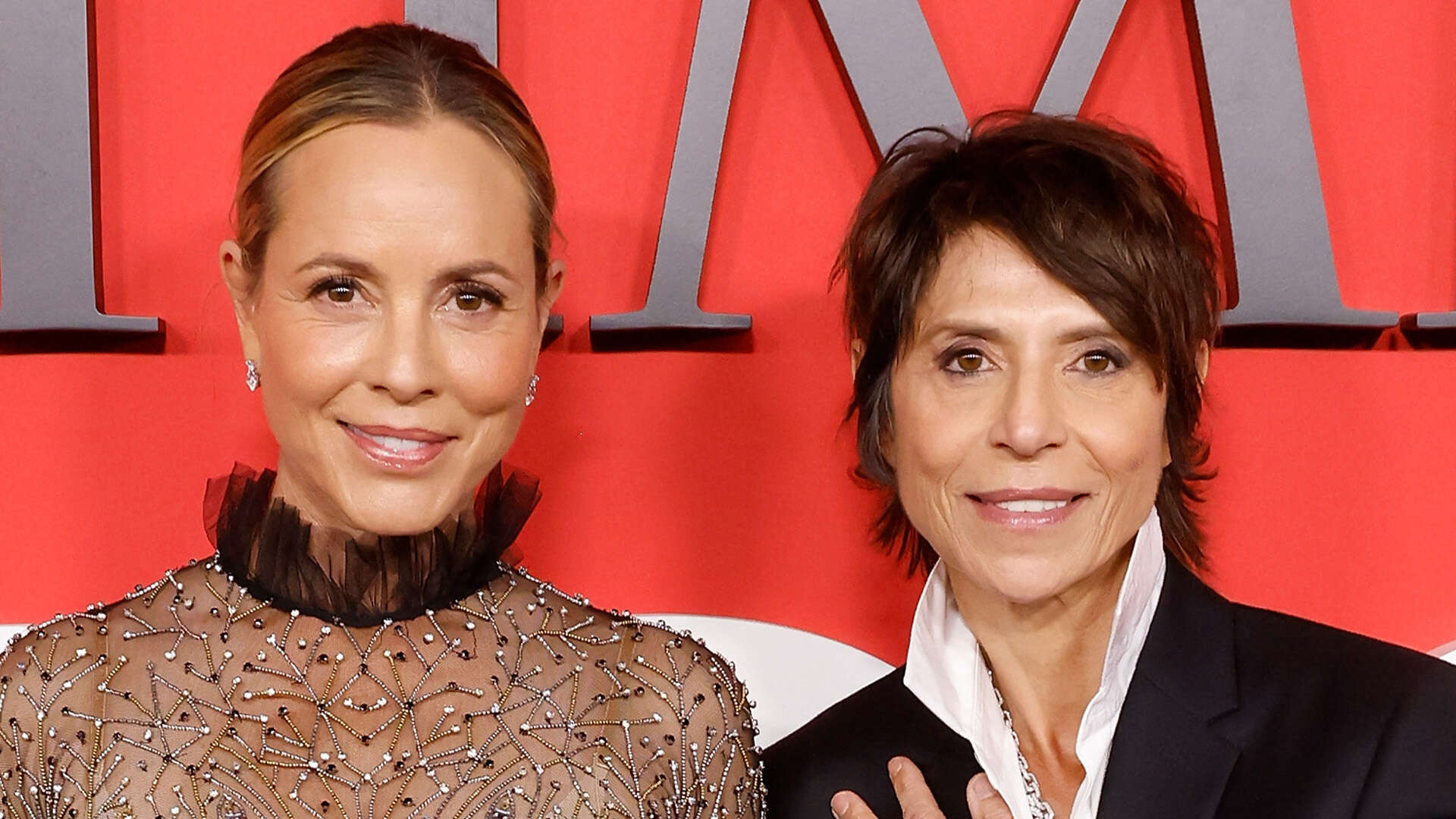 Maria Bello, 56, and star chef Dominique Crenn pose with wedding rings at NYC gala after 4-year engagement