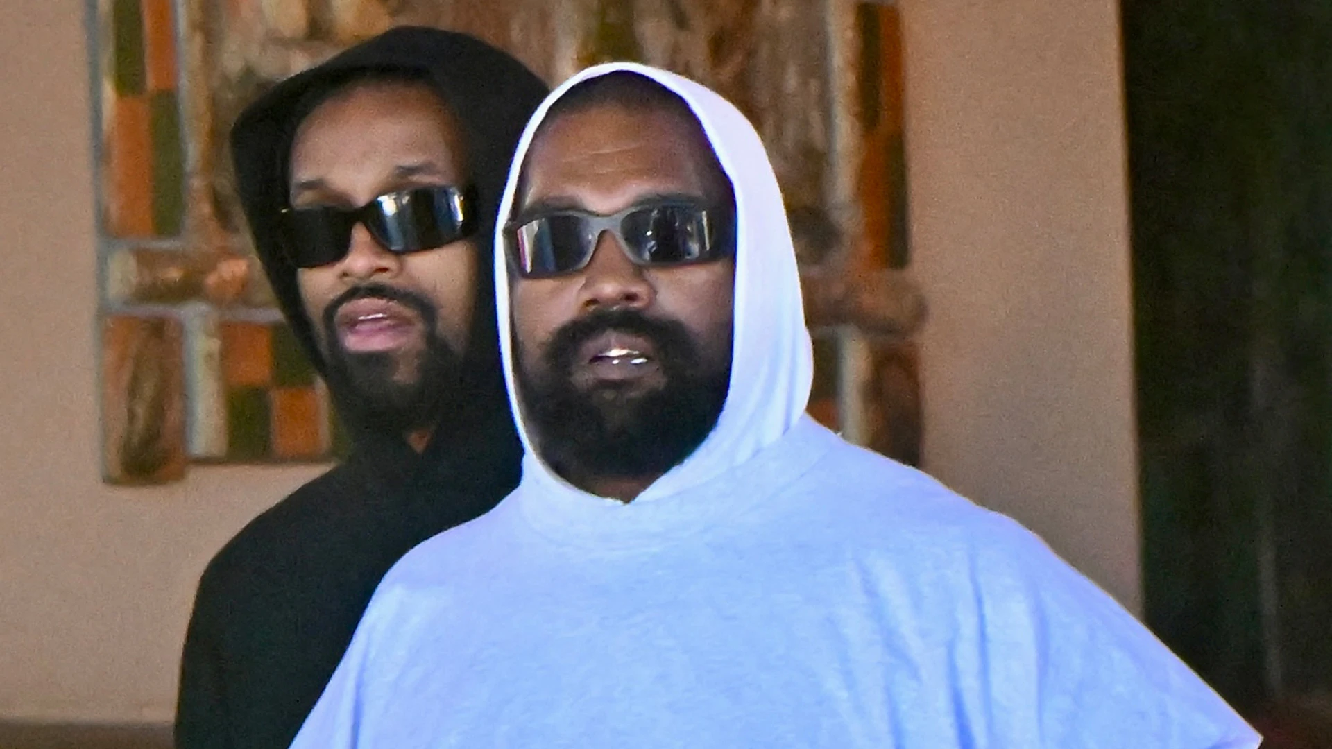 Kanye West takes daughter North, 11, to Disneyland without Bianca Censori – but is surrounded by large swarm of security