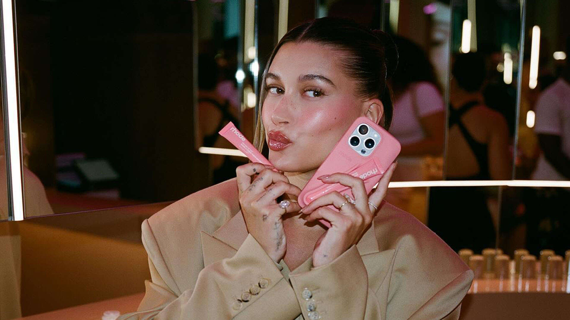 Hailey Bieber’s Rhode hit with F rating by BBB for lip gloss that ‘smells like mold’ and ‘refusing’ to refund customers