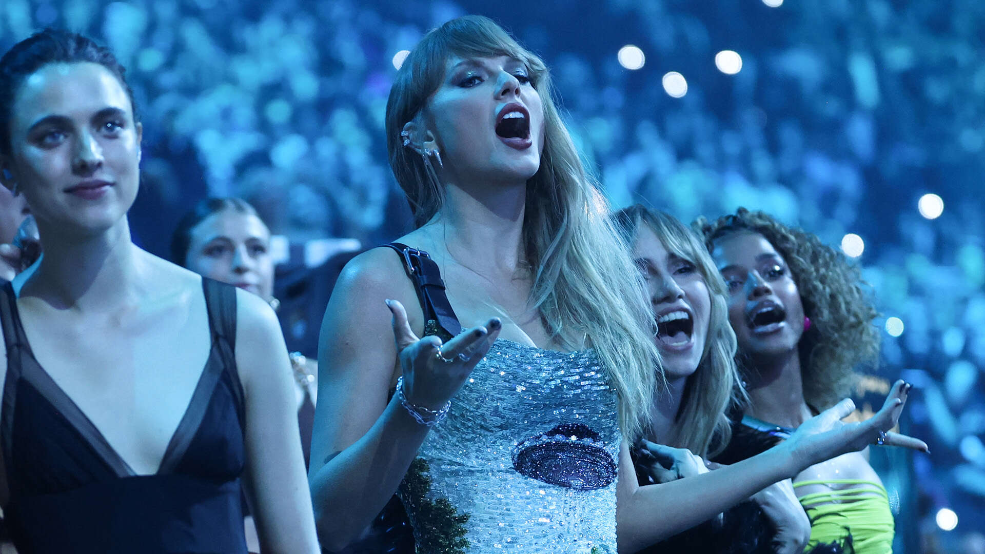 Taylor Swift’s reaction to former enemy Katy Perry nearly kissing Doechii during VMAs performance caught on camera