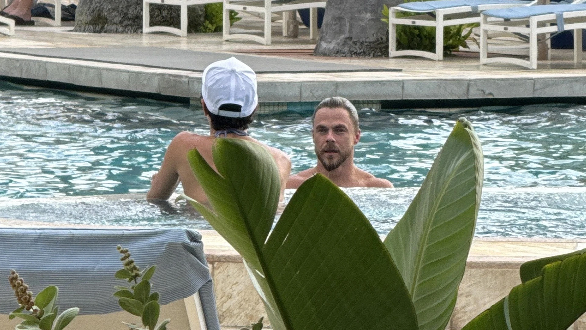 Derek Hough and wife Hayley Erbert enjoy tropical vacation in new photos five months after her emergency surgery