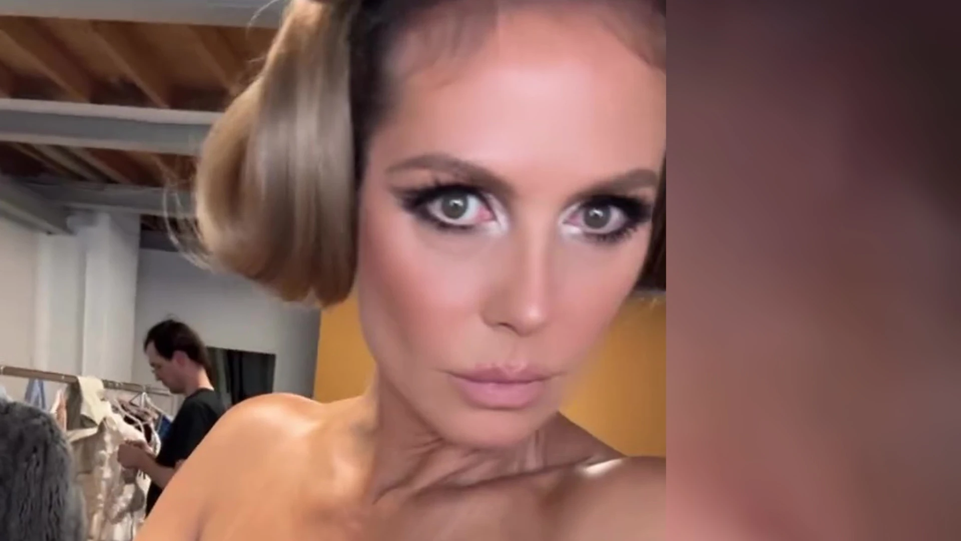 Heidi Klum goes totally topless in just nude tights for new selfie video as she gets ready backstage of Loreal ad