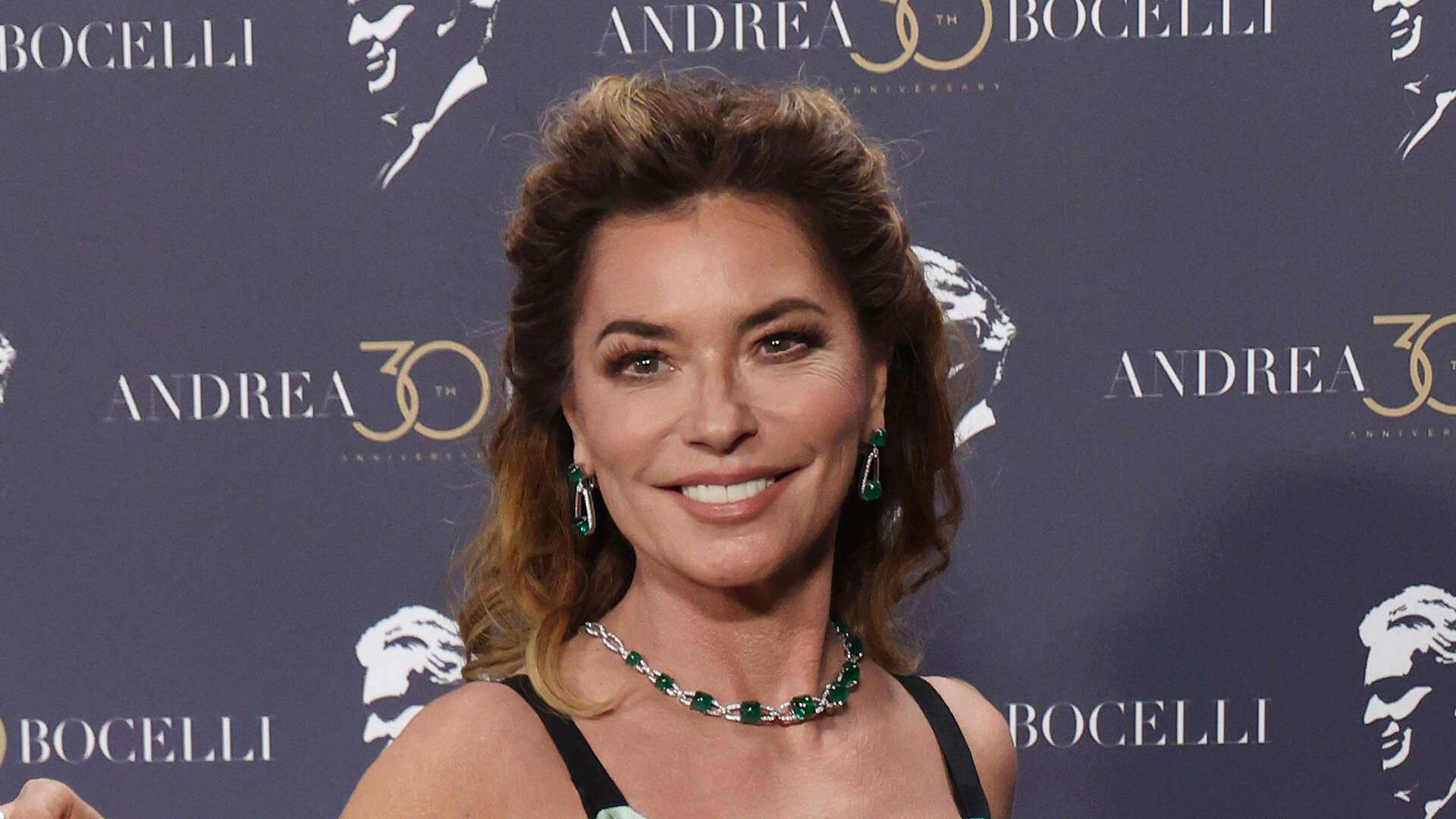 Shania Twain covers up in ‘gorgeous’ dress at Andrea Bocelli 30 after singer faced backlash over lack of clothes at show