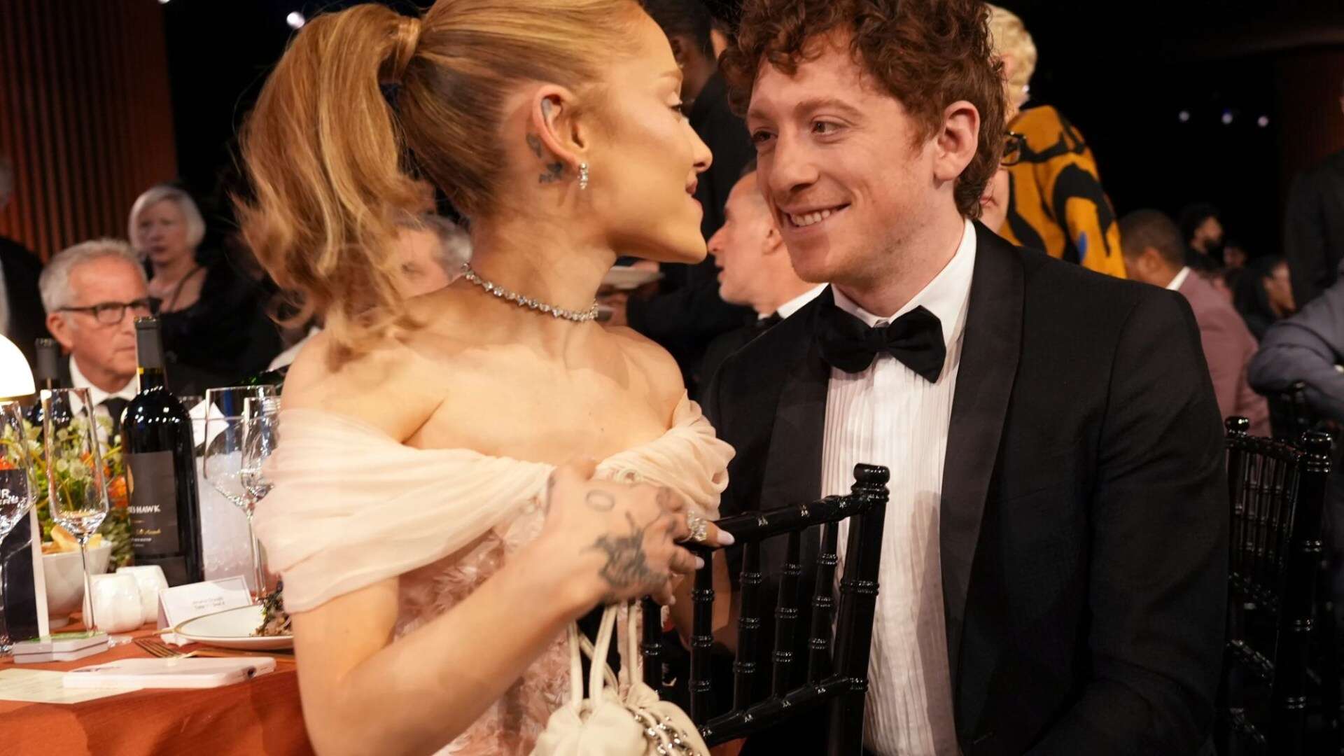 Ariana Grande and boyfriend Ethan Slater can’t keep their hands off each other as they cosy up at SAG Awards