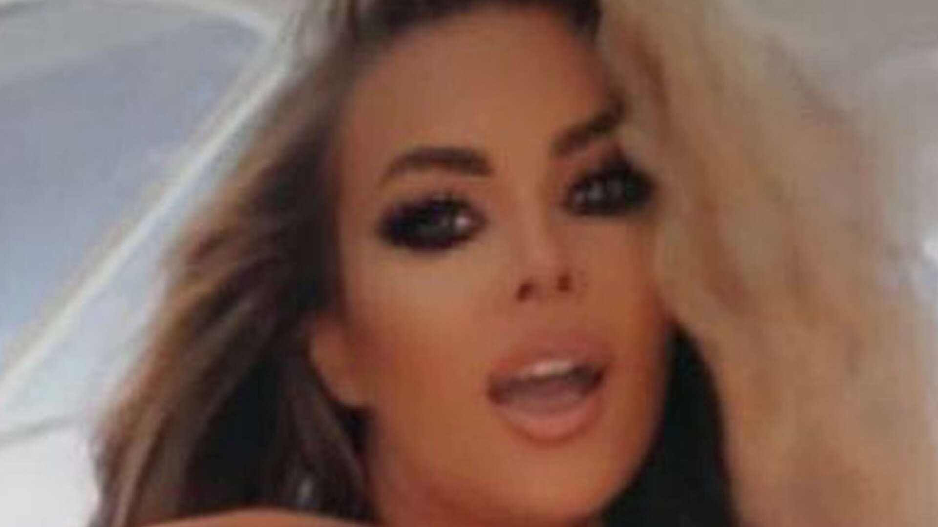 Carmen Electra, 51, wears just revealing black lingerie and sky-high heels as fans call her the ‘perfect woman’