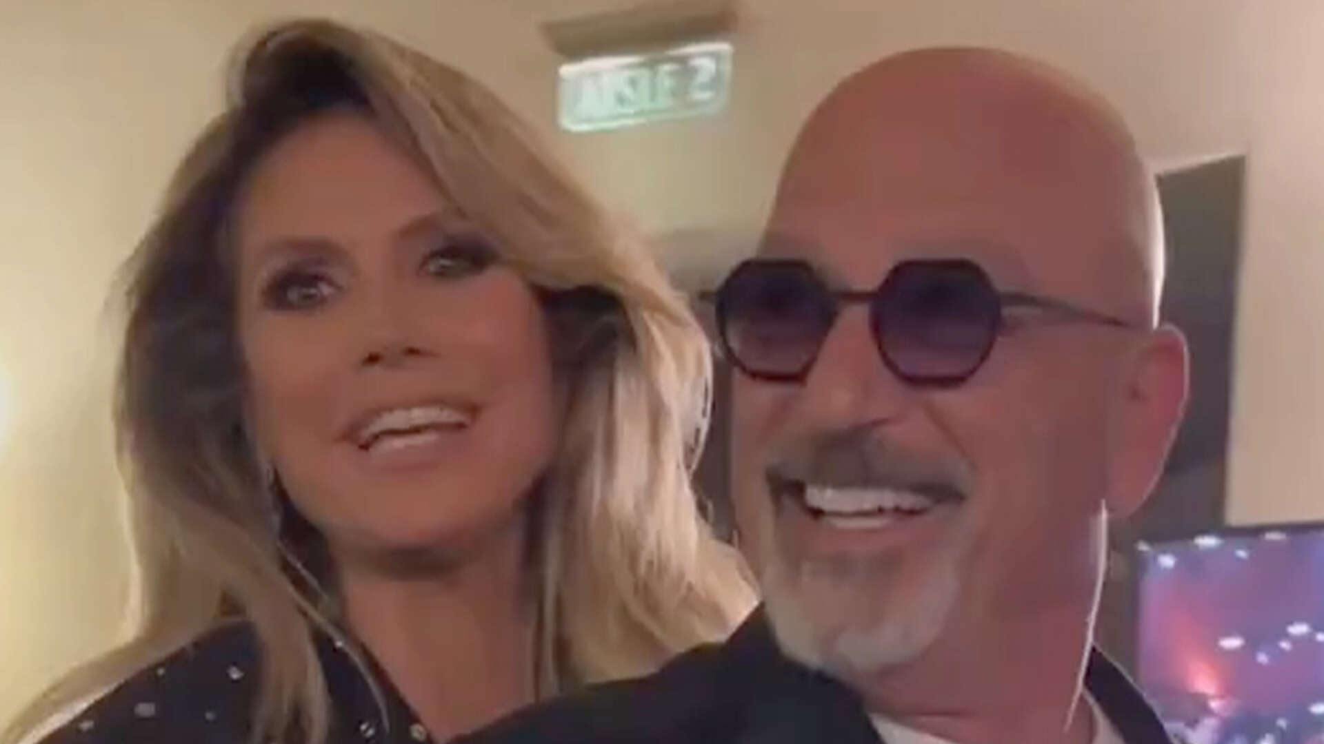 Heidi Klum rubs down AGT co-star Howie Mandel as he says intimate touching is ‘getting him excited’ before showtime