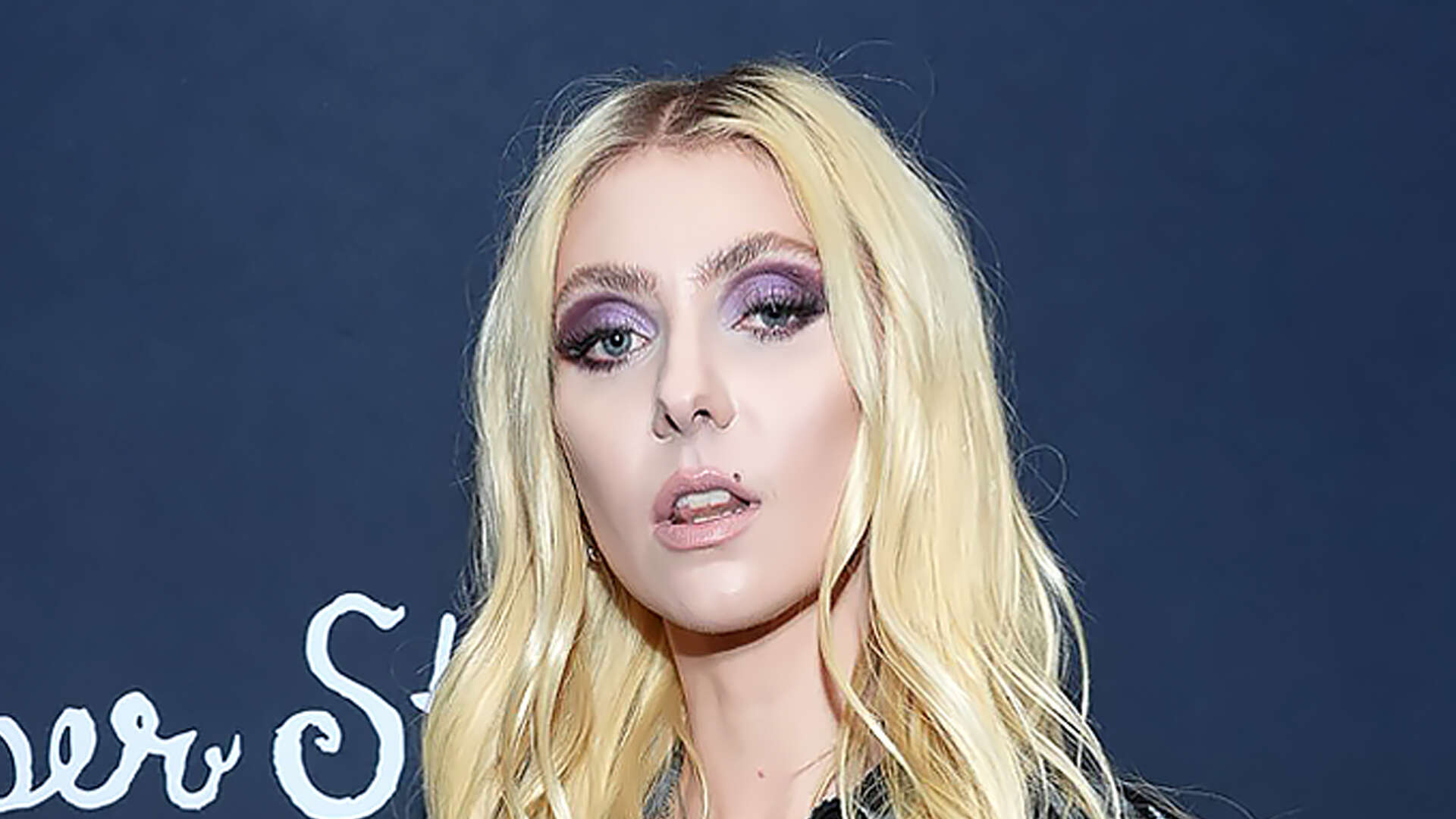 Taylor Momsen covers breasts with tape for topless red carpet look as actress looks worlds away from Gossip Girl role