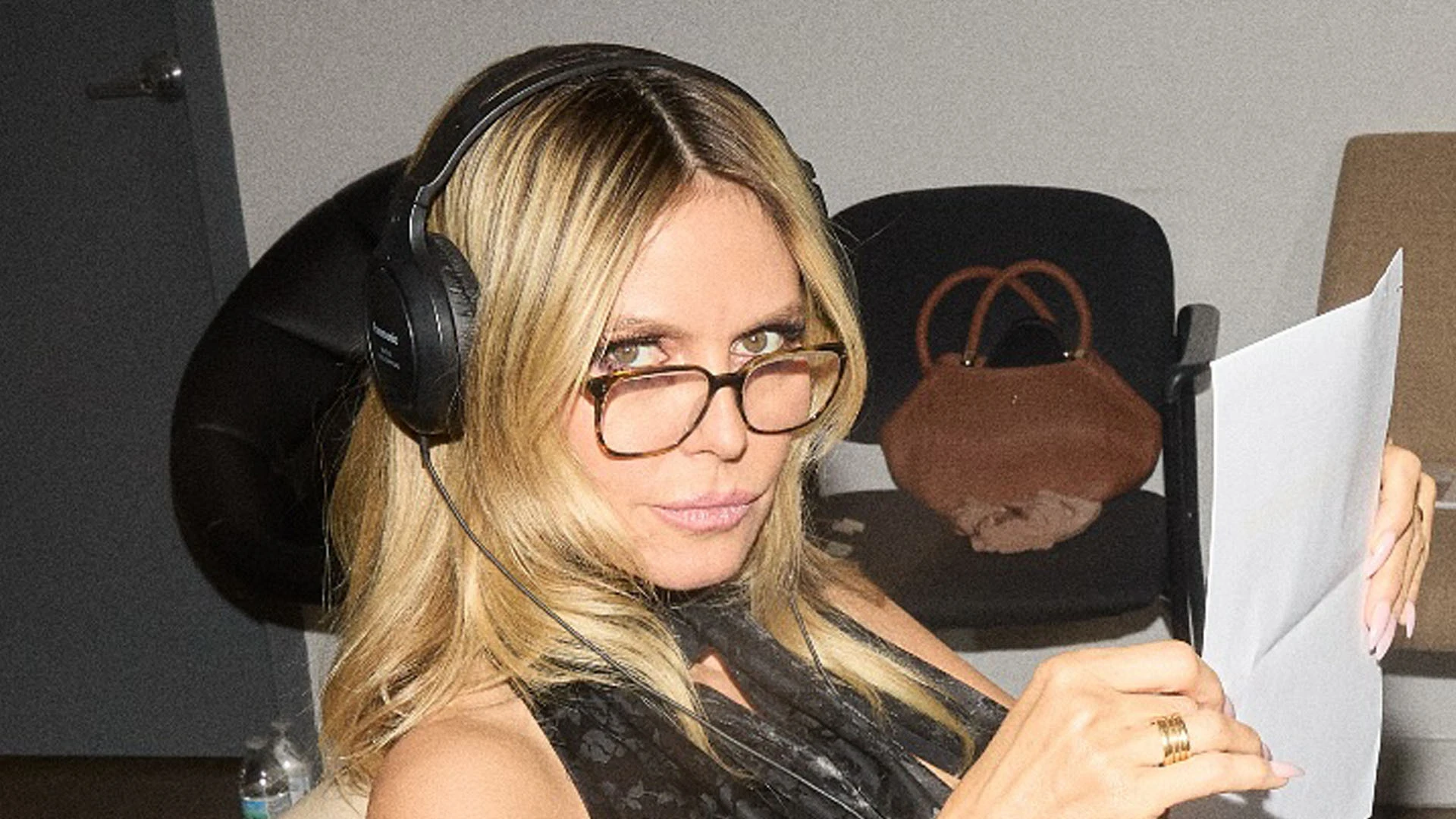 Heidi Klum goes pantless in just sheer tights as she tapes voiceovers for Germany’s Next Top Model