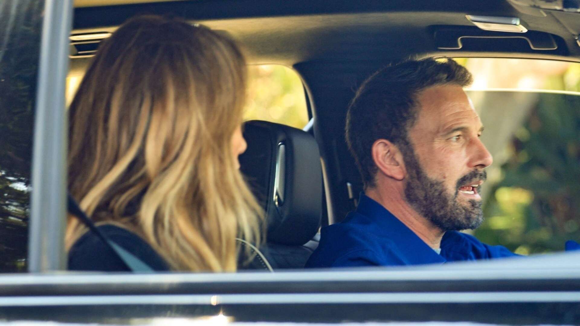 Ben Affleck and Jennifer Lopez look tense as they reunite for the first time since split and spark wedding ring riddle