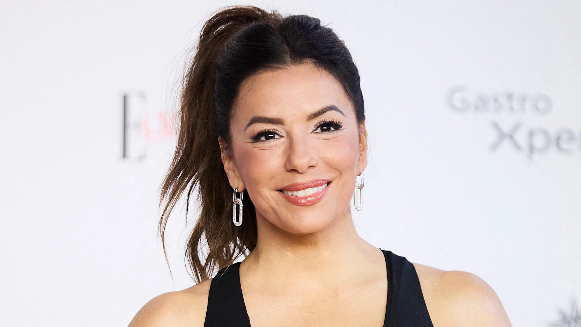 Eva Longoria, 49, goes braless in plunging black triangle gown that hugs her ‘ageless’ curves at Elle Awards in Madrid