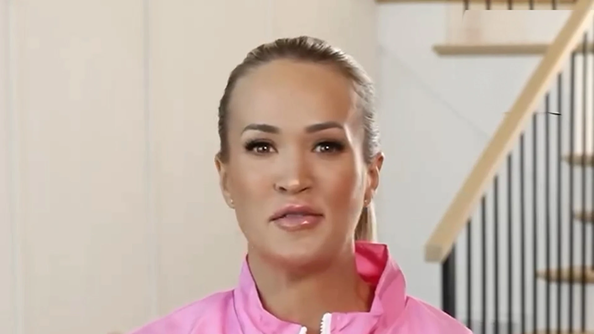 Carrie Underwood impresses fans with her toned figure as singer wears short shorts and tank for intense workout