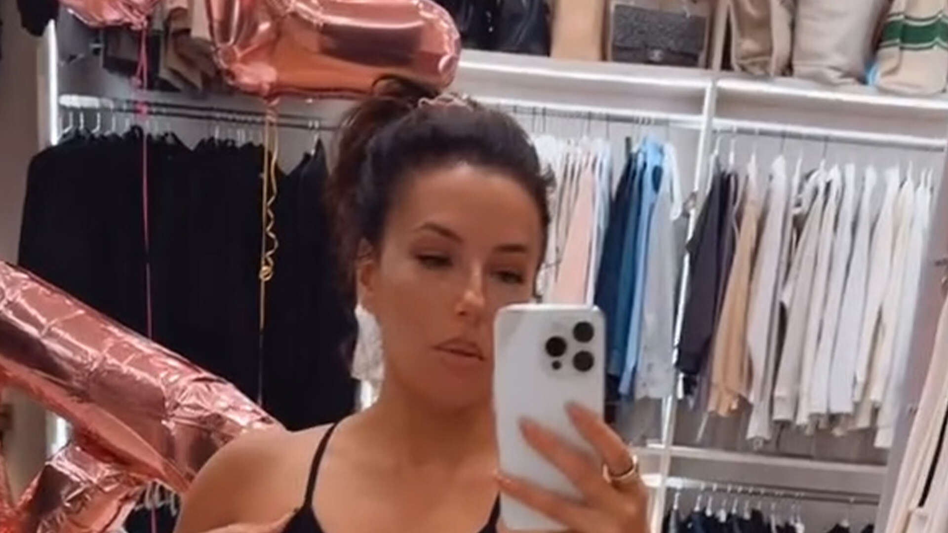 Eva Longoria flaunts her toned figure in leggings and sports bra as she urges ‘look at my butt’ inside massive closet