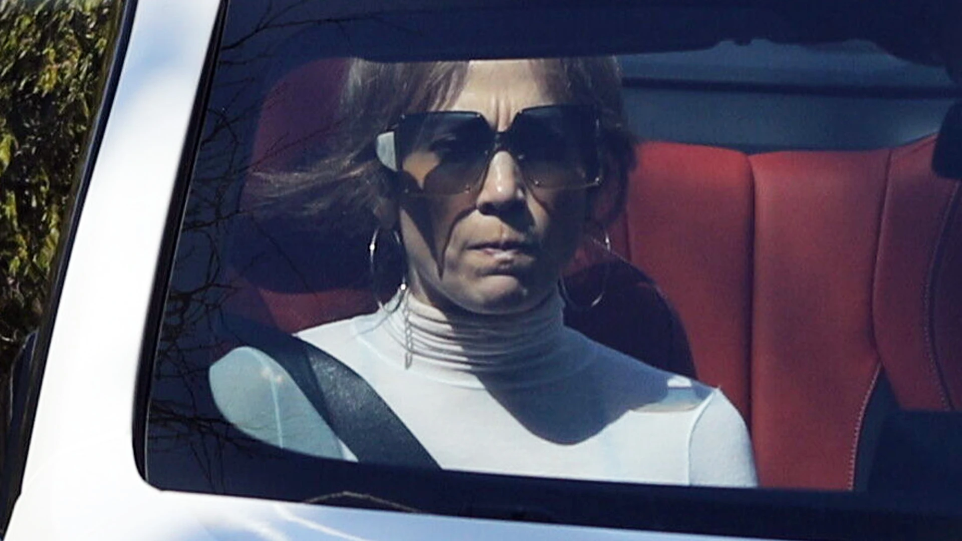 Jennifer Lopez looks stern in car with manager just days after singer cancels tour during Ben Affleck divorce rumors
