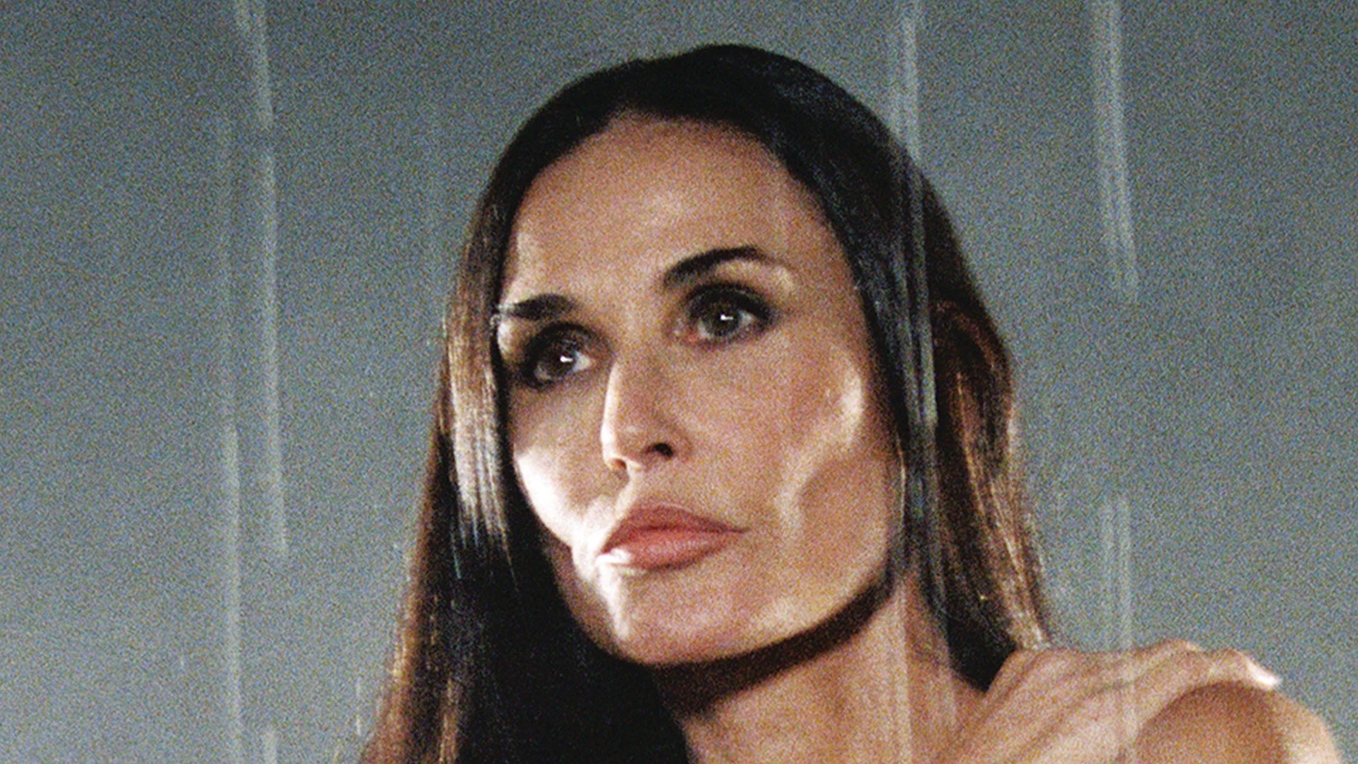Demi Moore, 61, looks ageless as she recreates racy Striptease pose in just black blazer and tights for Interview shoot