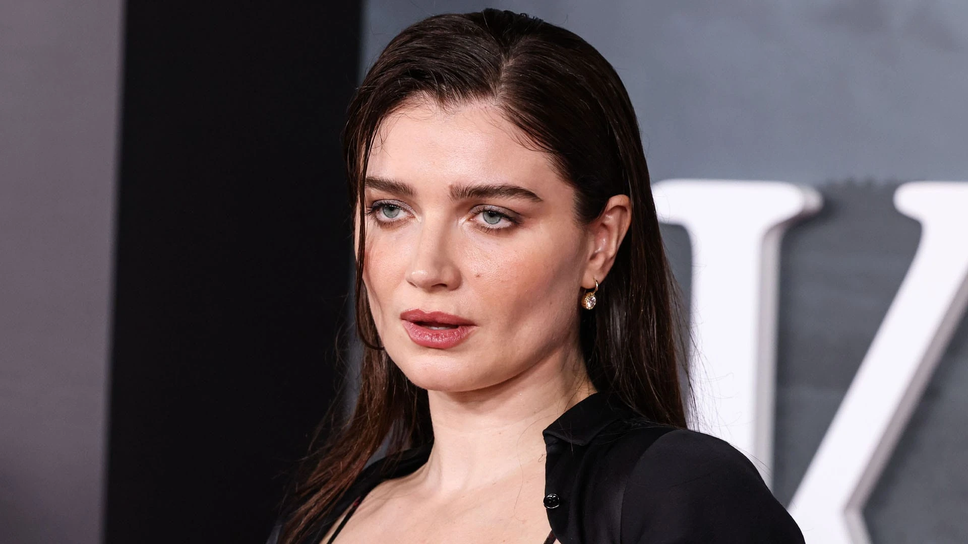 Bono’s daughter Eve Hewson bares all in just a see-through black bra and skirt on LA red carpet
