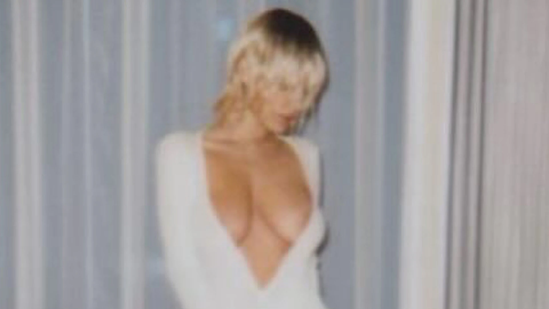 Bianca Censori nearly suffers wardrobe malfunction in plunging bodysuit as she poses in blond wig for husband Kanye West