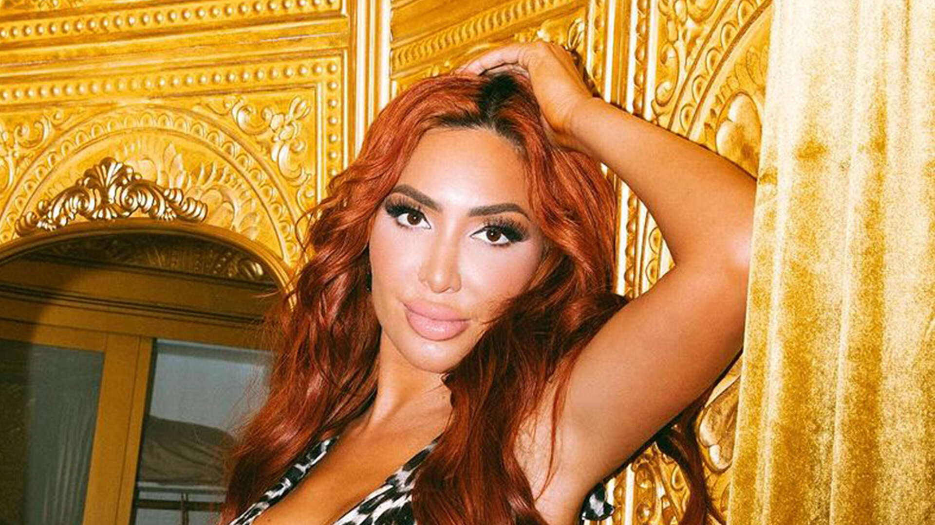 Teen Mom Farrah Abraham shows off her curves in a high-slit swimsuit as fans beg her to ‘stop getting plastic surgery’