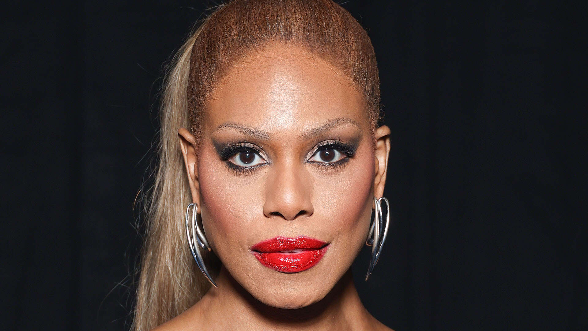 Laverne Cox rocks just pantyhose and corset as she rushes into Mugler fashion show in Paris