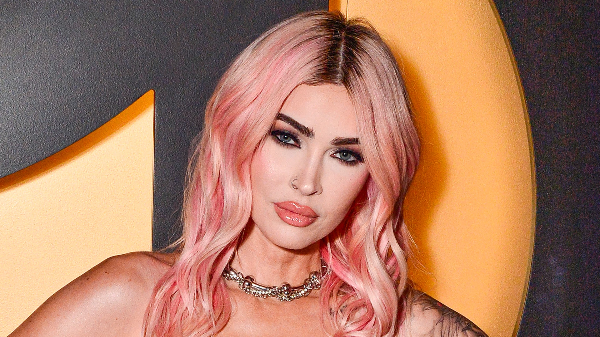 Megan Fox sparks confusion as she’s ‘not pregnant’ despite wearing baby bump in boyfriend MGK’s Lonely Road music video