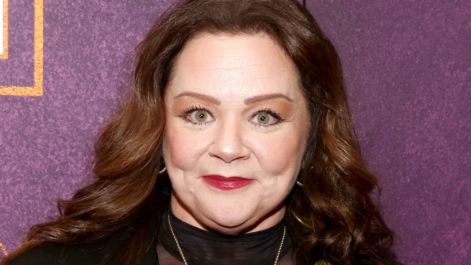 Melissa McCarthy poses in a sheer black top and matching pants for NYC event after weight-loss transformation