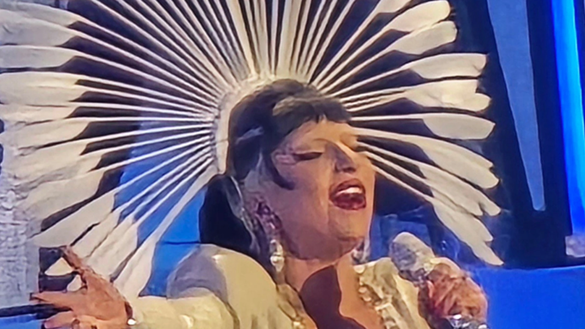 Lady Gaga takes to stage in low cut figure-hugging dress for delayed Las Vegas show after responding to pregnancy rumors