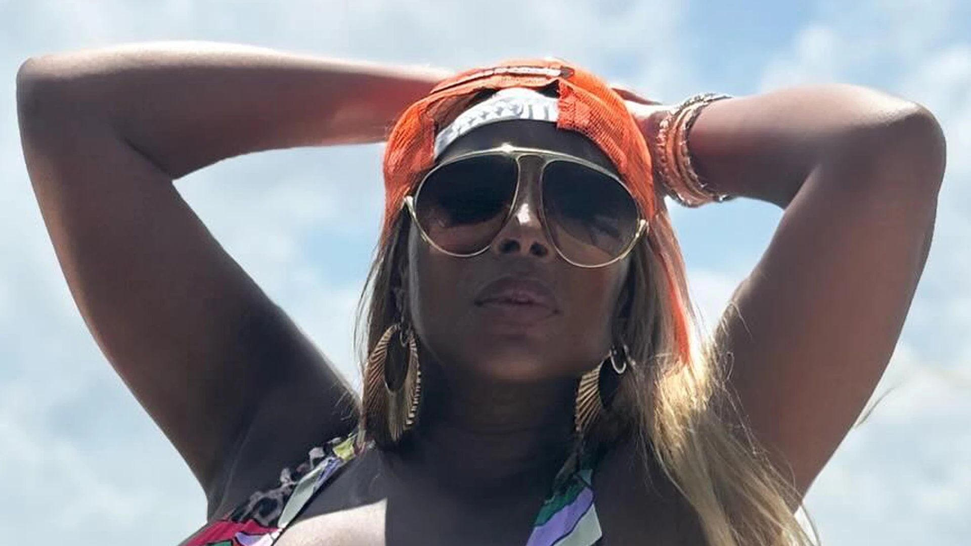 Mary J. Blige, 54, reveals breathtaking beach body in a rainbow bikini on boat
